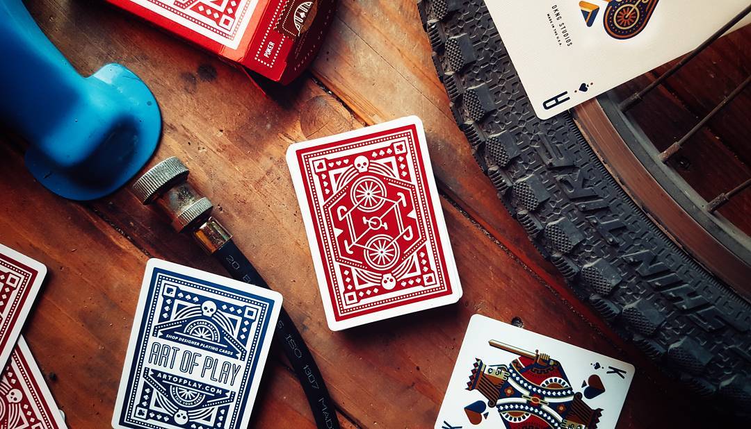 Red Wheel Playing Cards by DKNG